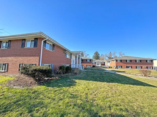 a house view with a garden space
