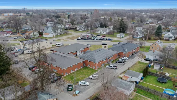 an aerial view of a city with lots of residential buildings