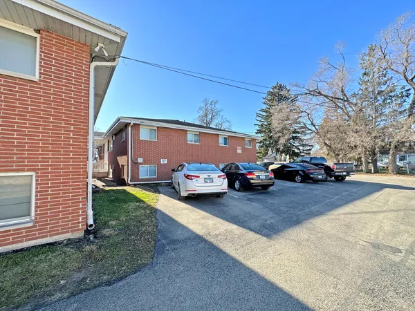 a car parked in front of a house