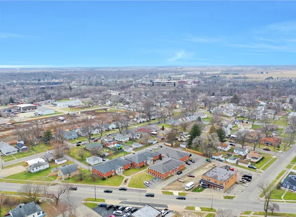 an aerial view of residential building and street
