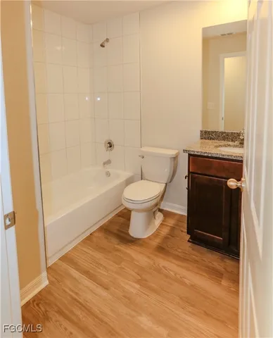 a bathroom with a toilet and a sink