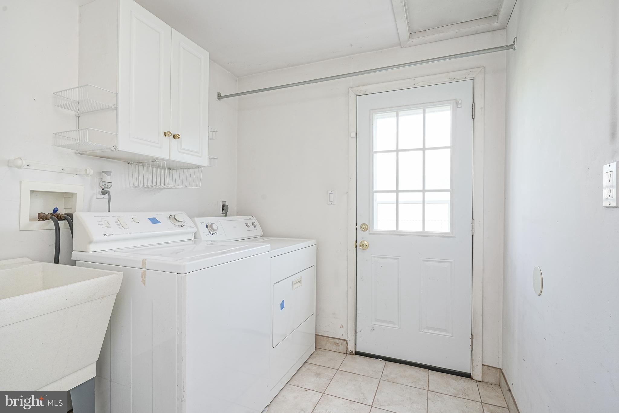 152 Kelly Driver Road Laurel Springs, NJ 08021 - Photo 17 of 30 a utility room with cabinets washer and dryer