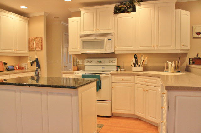 3880 Davis Road Penn Laird, VA 22846 - Photo 3 of 20 a kitchen with stainless steel appliances granite countertop a sink and a white cabinets