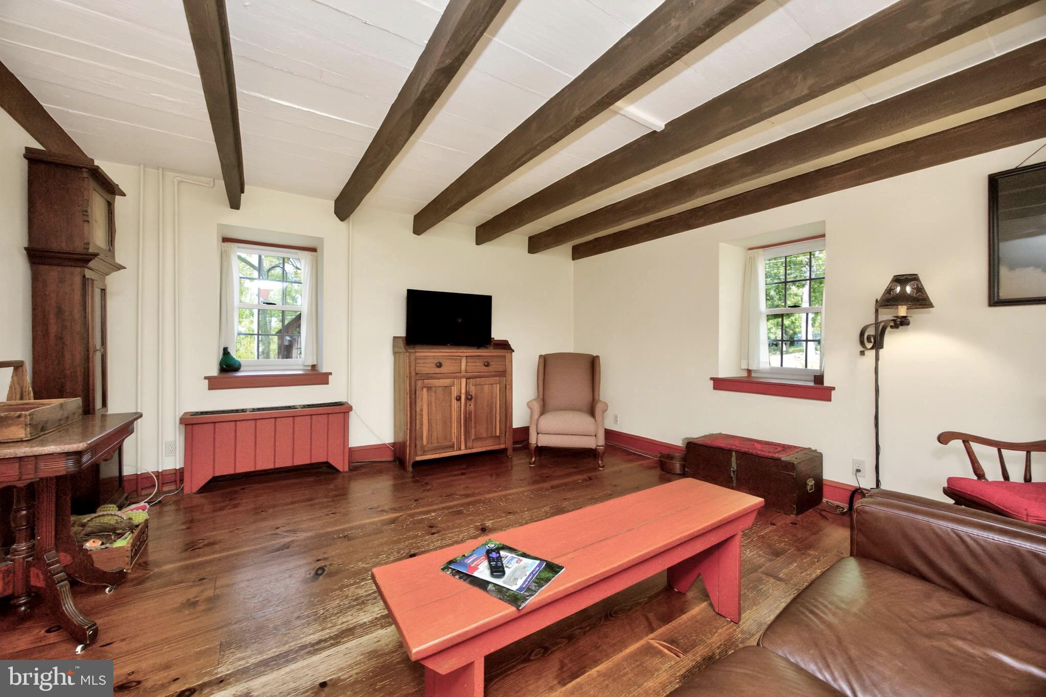 1717 Unionville Road Pottstown, PA 19465 - Photo 15 of 50 Great rm w/beamed ceiling & wood floor