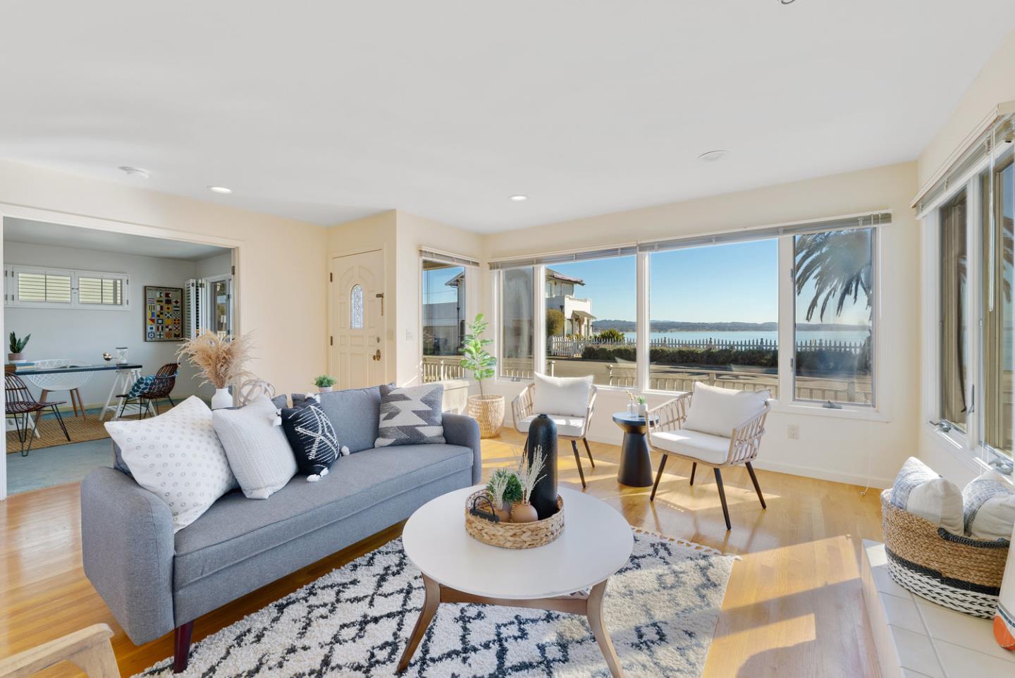 1385 Prospect Avenue Capitola, CA 95010 - Photo 11 of 41 a living room with furniture and a large window