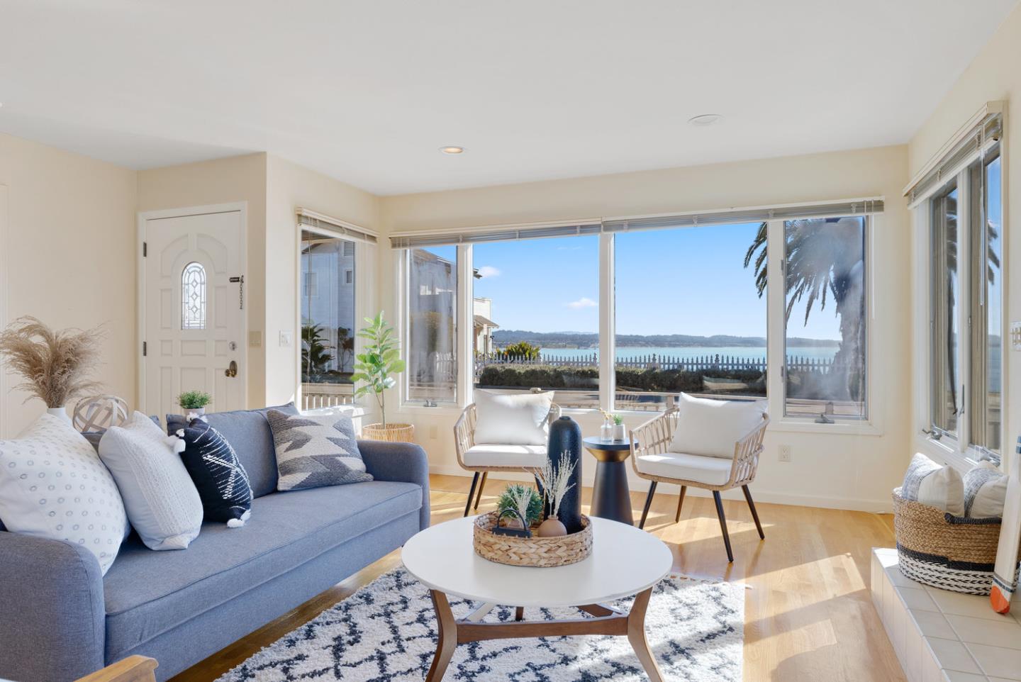 1385 Prospect Avenue Capitola, CA 95010 - Photo 12 of 41 a living room with furniture and a large window