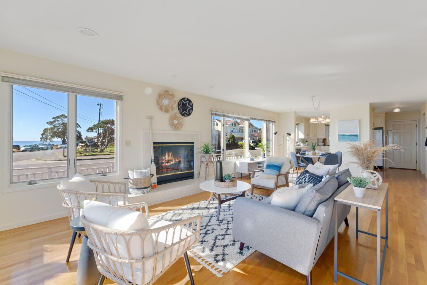 1385 Prospect Avenue Capitola, CA 95010 - Photo 13 of 41 a living room with furniture a fireplace and a table