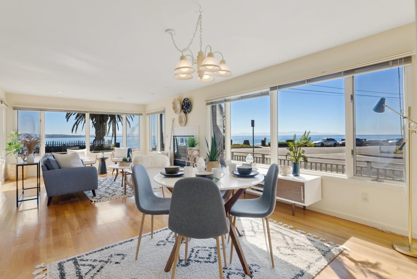 1385 Prospect Avenue Capitola, CA 95010 - Photo 15 of 41 a living room with fireplace furniture and a wooden floor