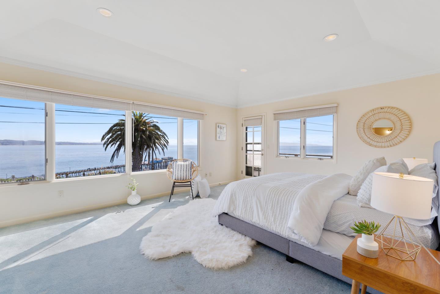 1385 Prospect Avenue Capitola, CA 95010 - Photo 25 of 41 a bedroom with a bed and ceiling fan