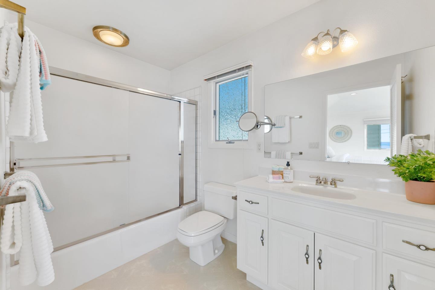 1385 Prospect Avenue Capitola, CA 95010 - Photo 28 of 41 a bathroom with a sink toilet and shower