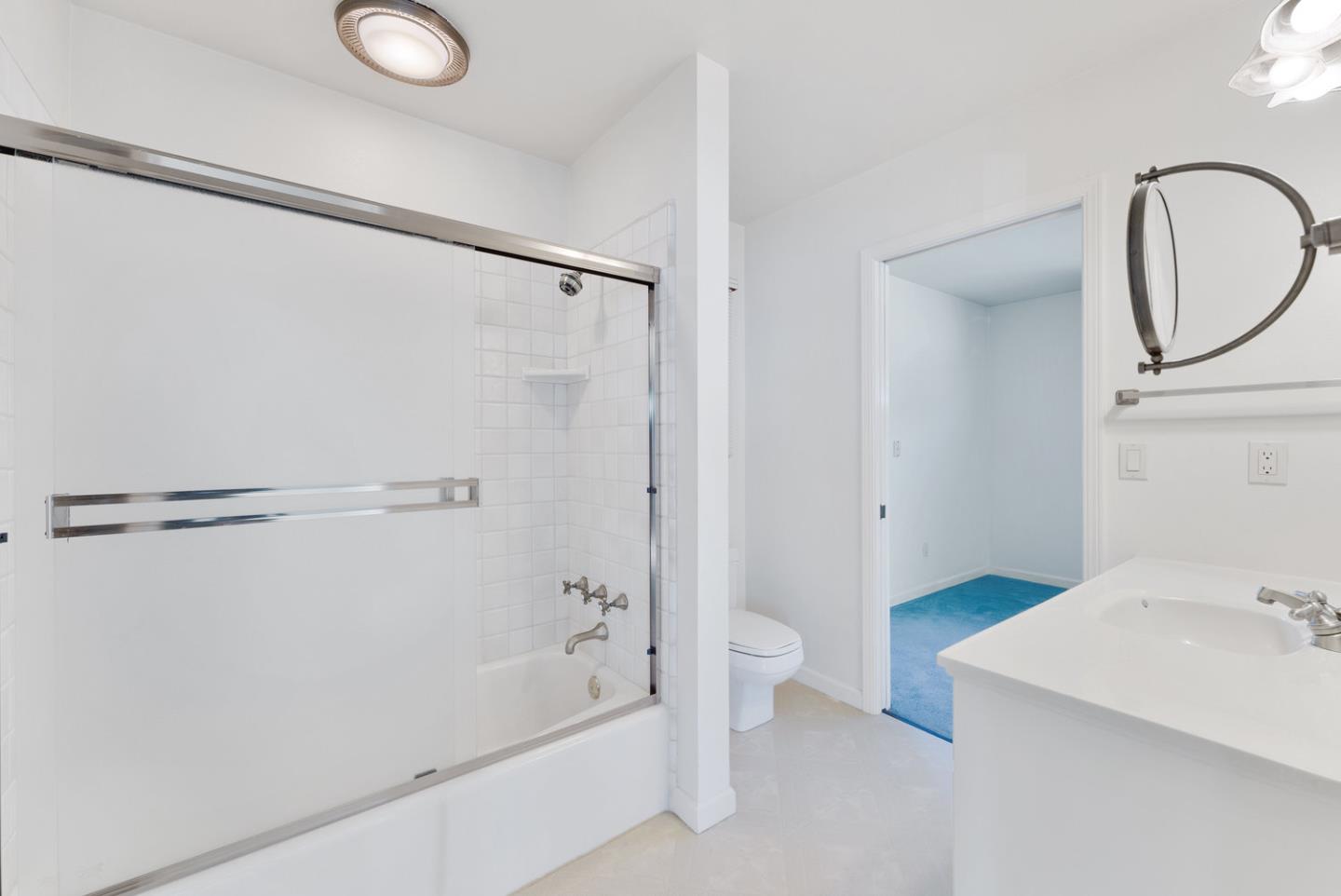 1385 Prospect Avenue Capitola, CA 95010 - Photo 33 of 41 a bathroom with a sink a toilet and a bathtub