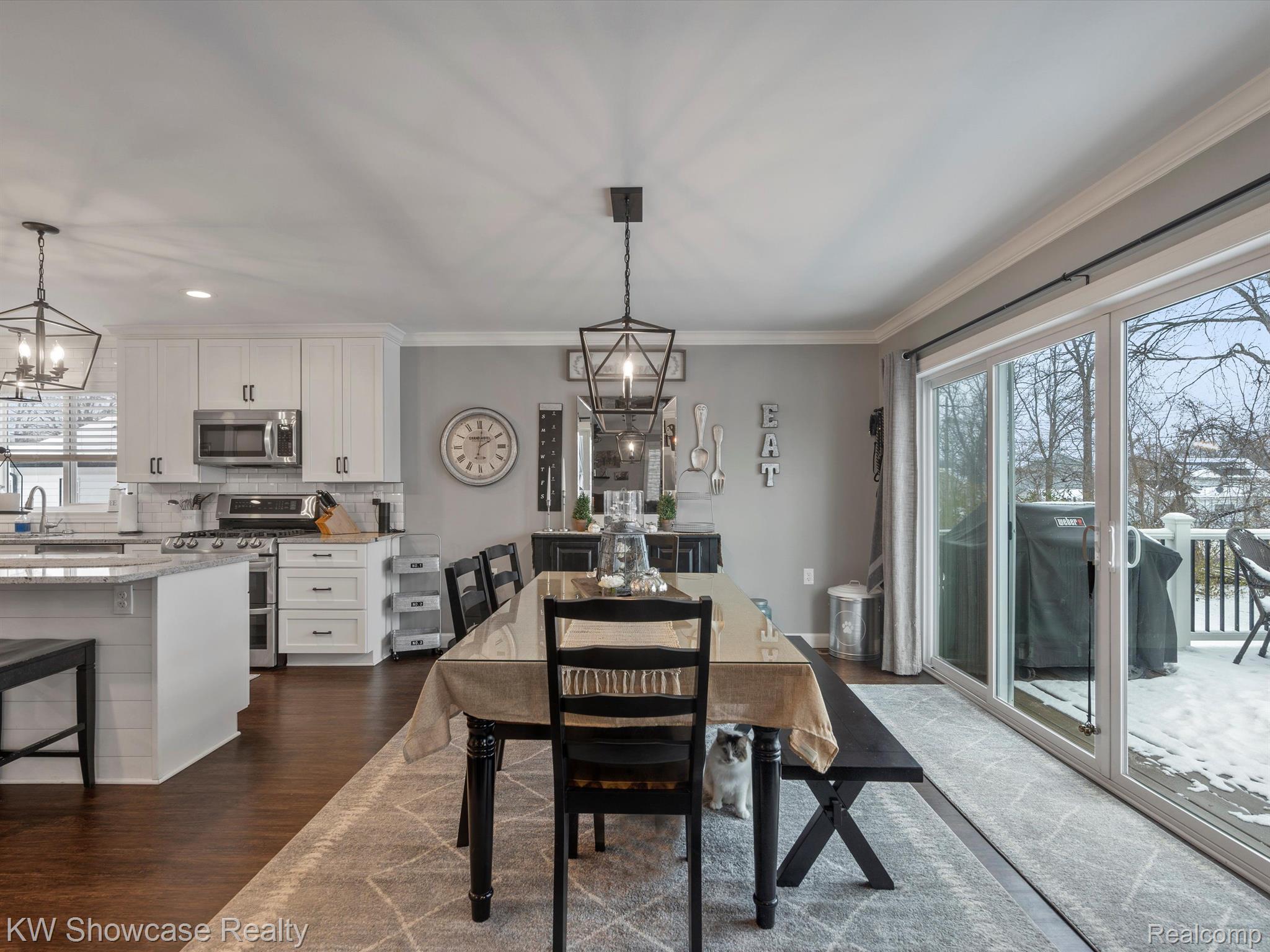 220 Mussey Street Romeo, MI 48065 - Photo 20 of 32 DINING AREA OFF OF TREX DECK