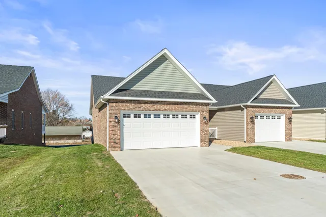a view of garage and yard