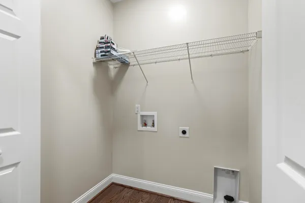 a view of a room with racks on the wall