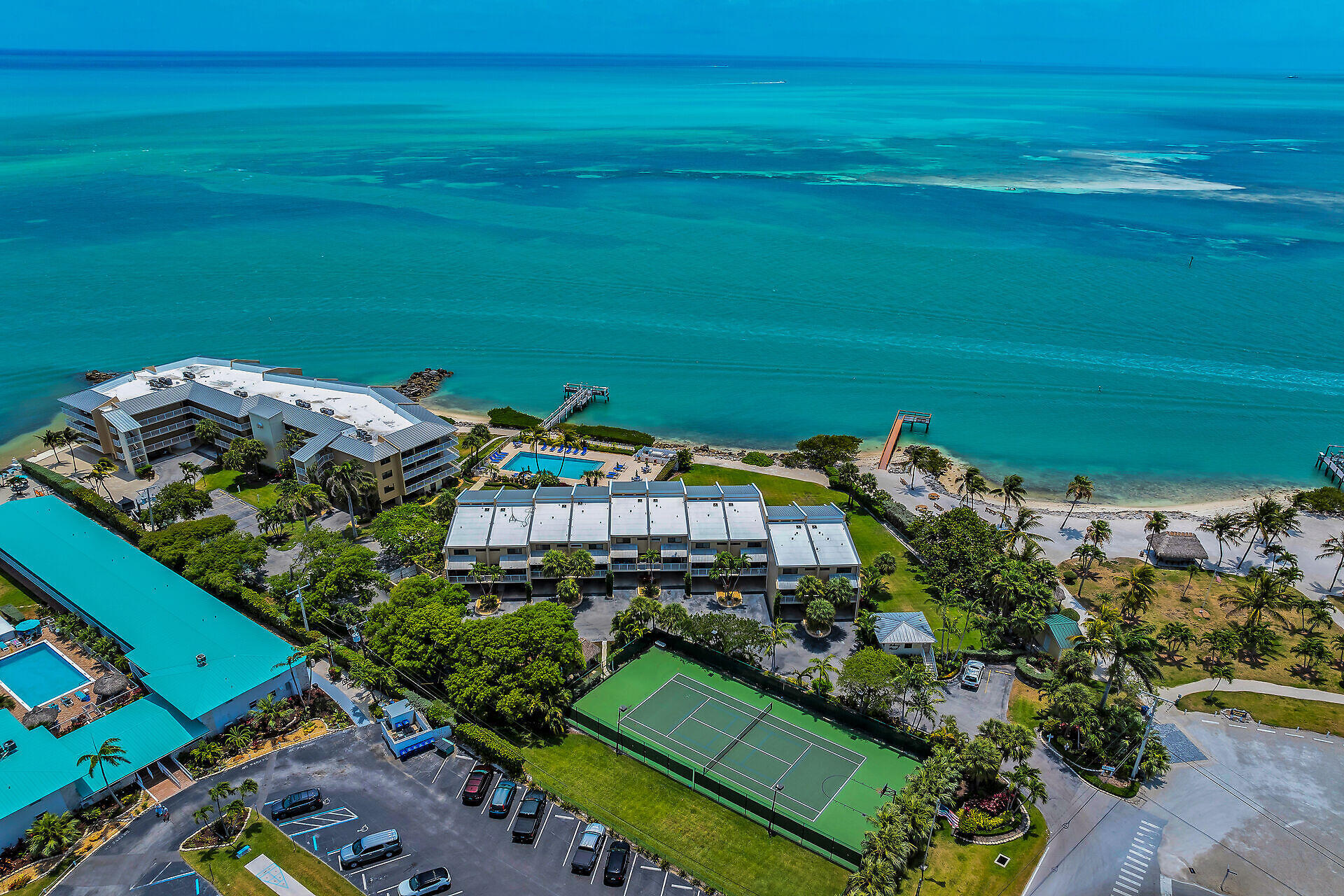 1133 West Ocean Drive, Unit 6 Key Colony Beach, FL 33051 - Photo 12 of 73 an aerial view of a houses with a yard