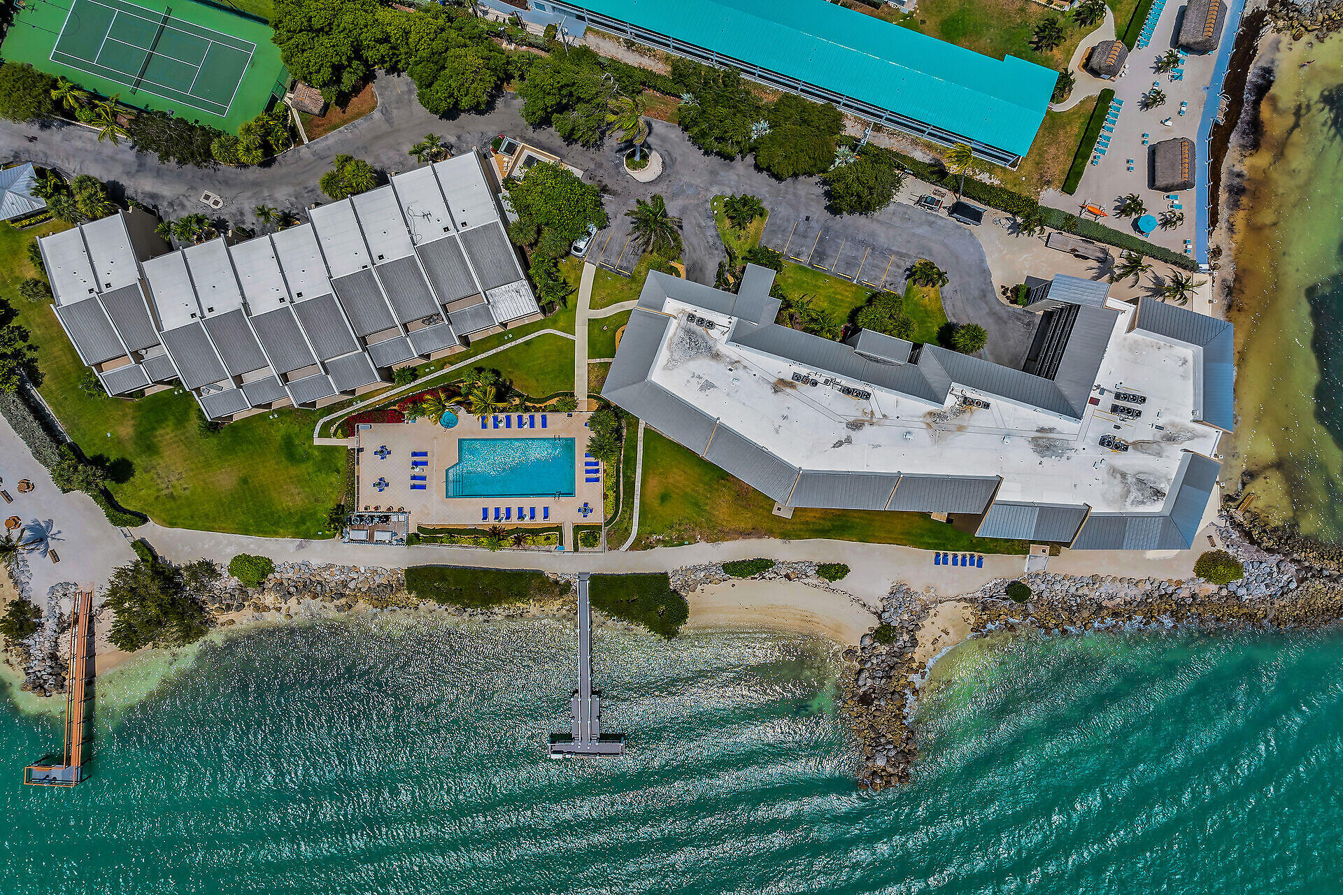 1133 West Ocean Drive, Unit 6 Key Colony Beach, FL 33051 - Photo 20 of 73 an aerial view of a house with a yard