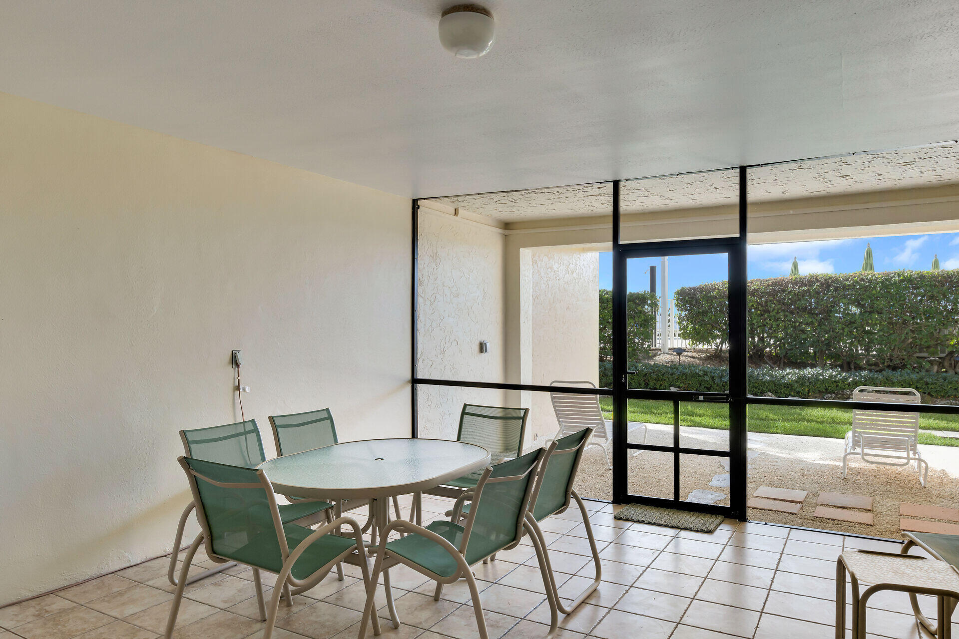 1133 West Ocean Drive, Unit 6 Key Colony Beach, FL 33051 - Photo 24 of 73 a view of a dining room with furniture window and outside view