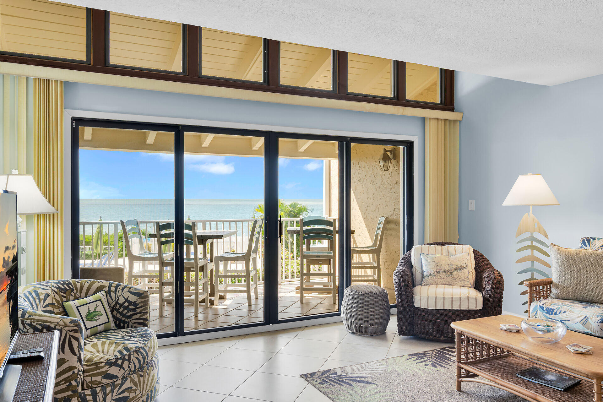 1133 West Ocean Drive, Unit 6 Key Colony Beach, FL 33051 - Photo 33 of 73 a living room with furniture and two large windows