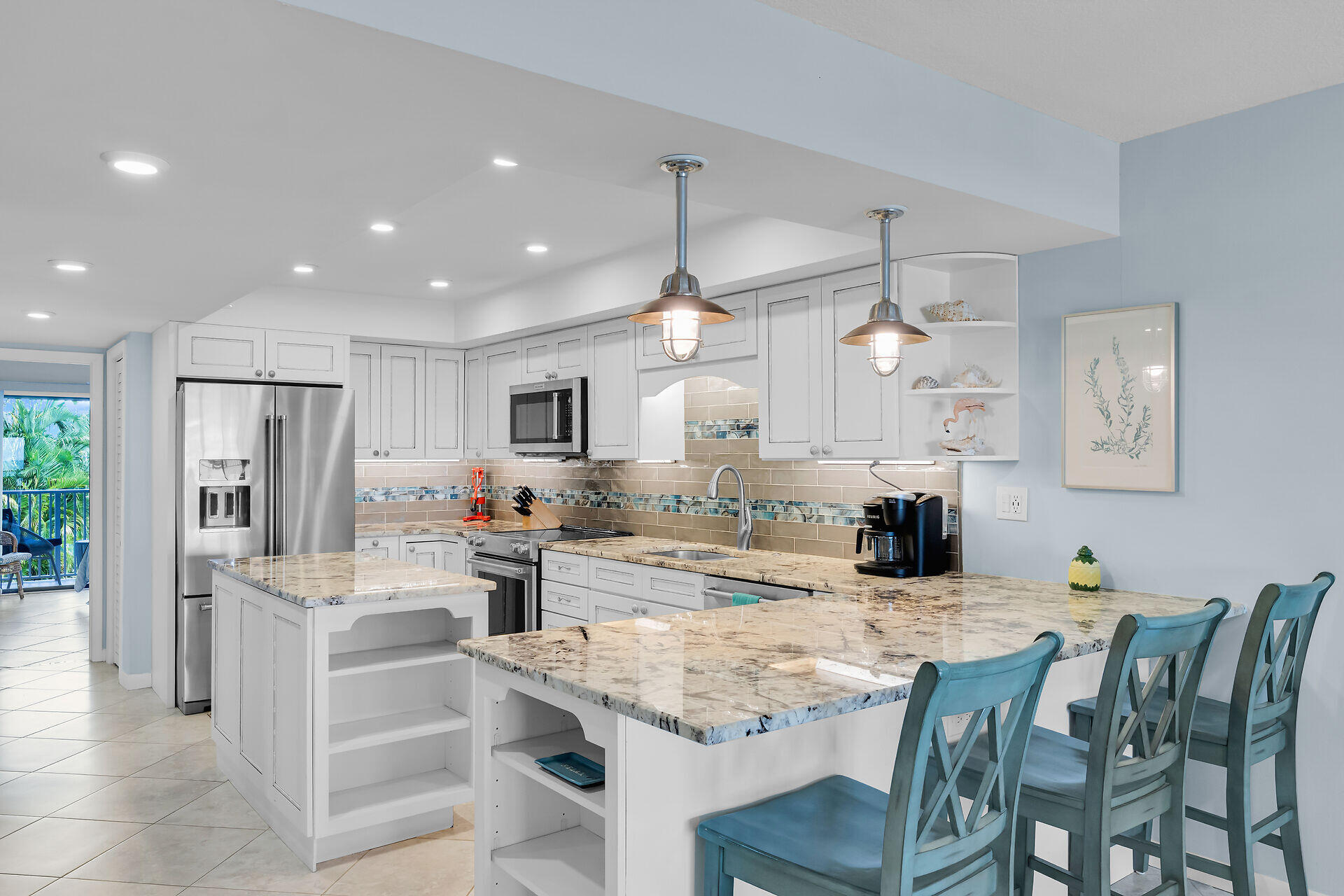 1133 West Ocean Drive, Unit 6 Key Colony Beach, FL 33051 - Photo 35 of 73 a kitchen with refrigerator and cabinets