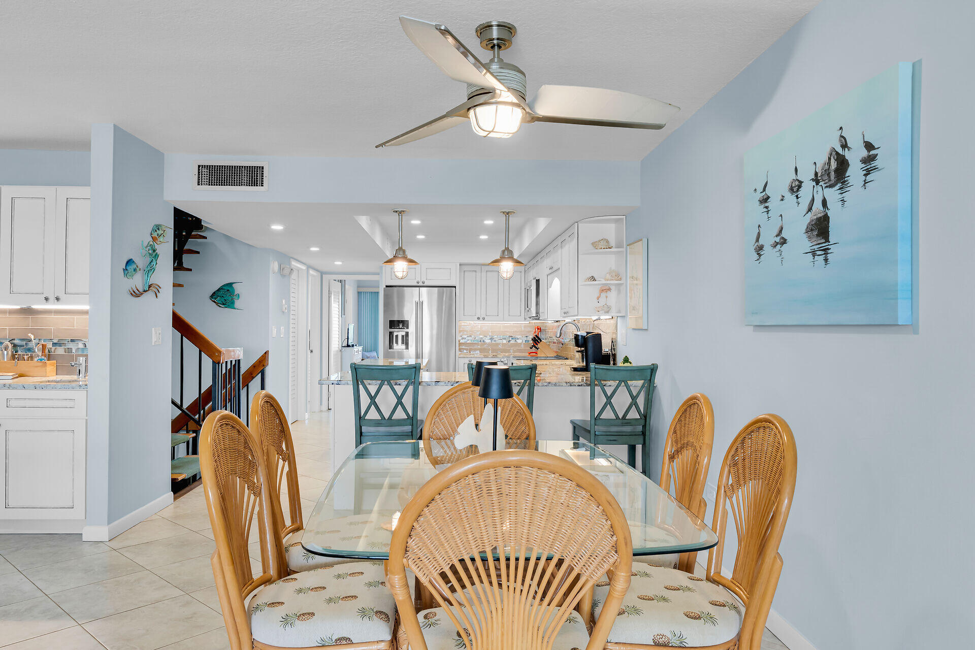 1133 West Ocean Drive, Unit 6 Key Colony Beach, FL 33051 - Photo 38 of 73 a living room with furniture a chandelier and a rug