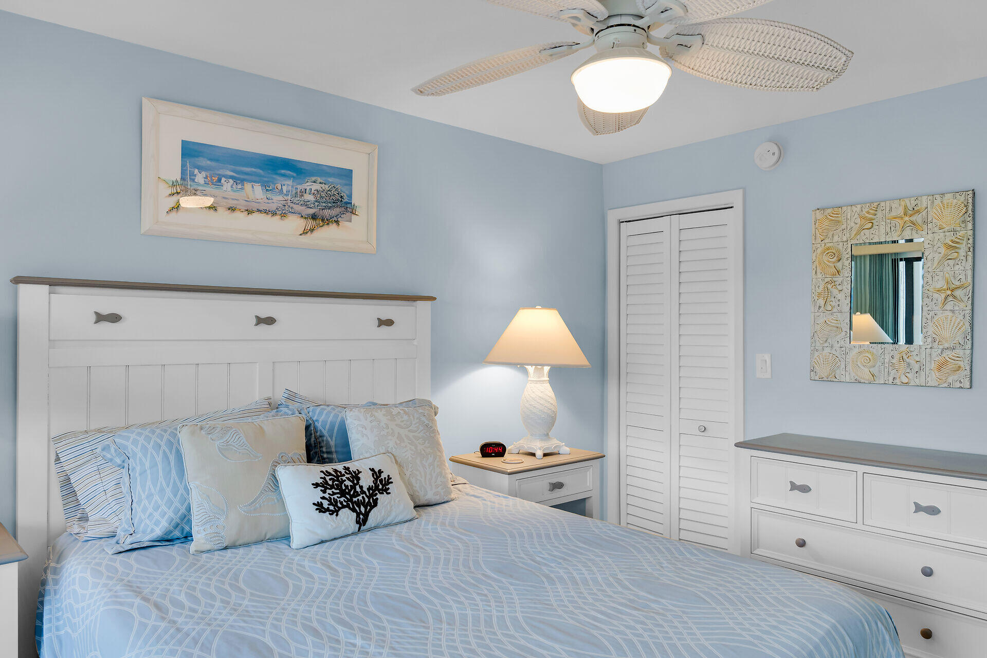 1133 West Ocean Drive, Unit 6 Key Colony Beach, FL 33051 - Photo 41 of 73 a bedroom with a bed and a chandelier