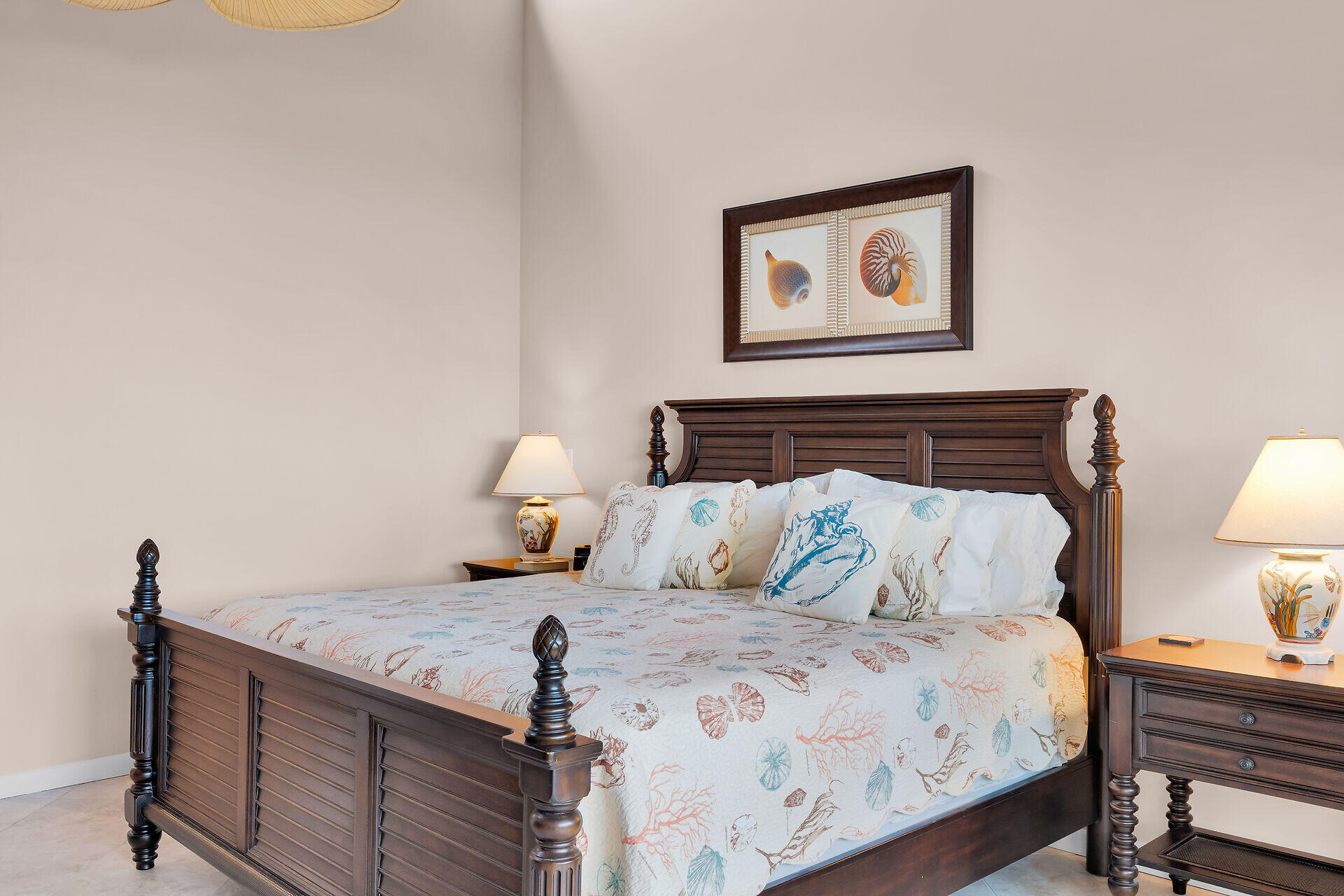 1133 West Ocean Drive, Unit 6 Key Colony Beach, FL 33051 - Photo 47 of 73 a bedroom with a bed and a lamp on table