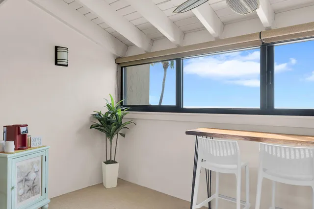a black and white photo of a living room