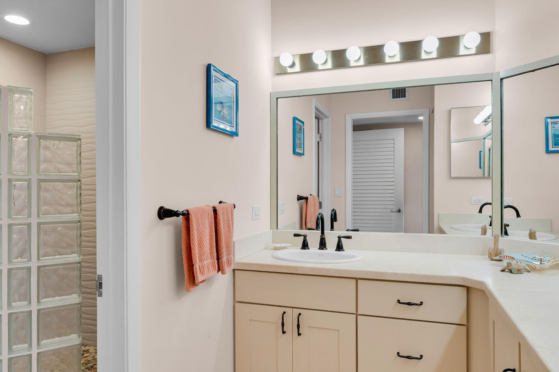 1133 West Ocean Drive, Unit 6 Key Colony Beach, FL 33051 - Photo 53 of 73 a bathroom with a sink and a mirror