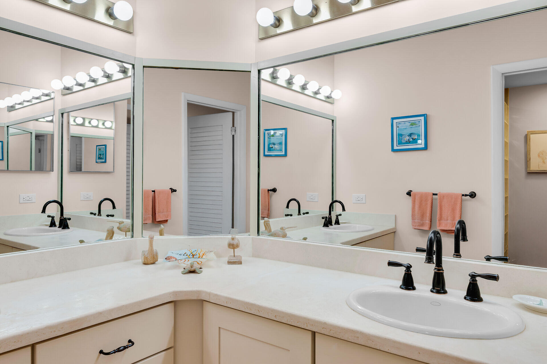 1133 West Ocean Drive, Unit 6 Key Colony Beach, FL 33051 - Photo 54 of 73 a bathroom with a sink and a mirror