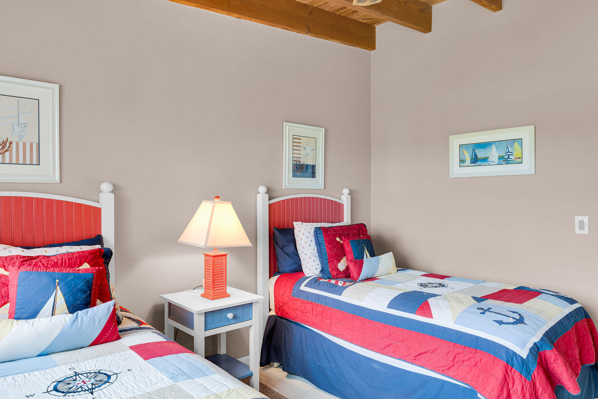 1133 West Ocean Drive, Unit 6 Key Colony Beach, FL 33051 - Photo 56 of 73 a bedroom with bed and a lamp on dresser