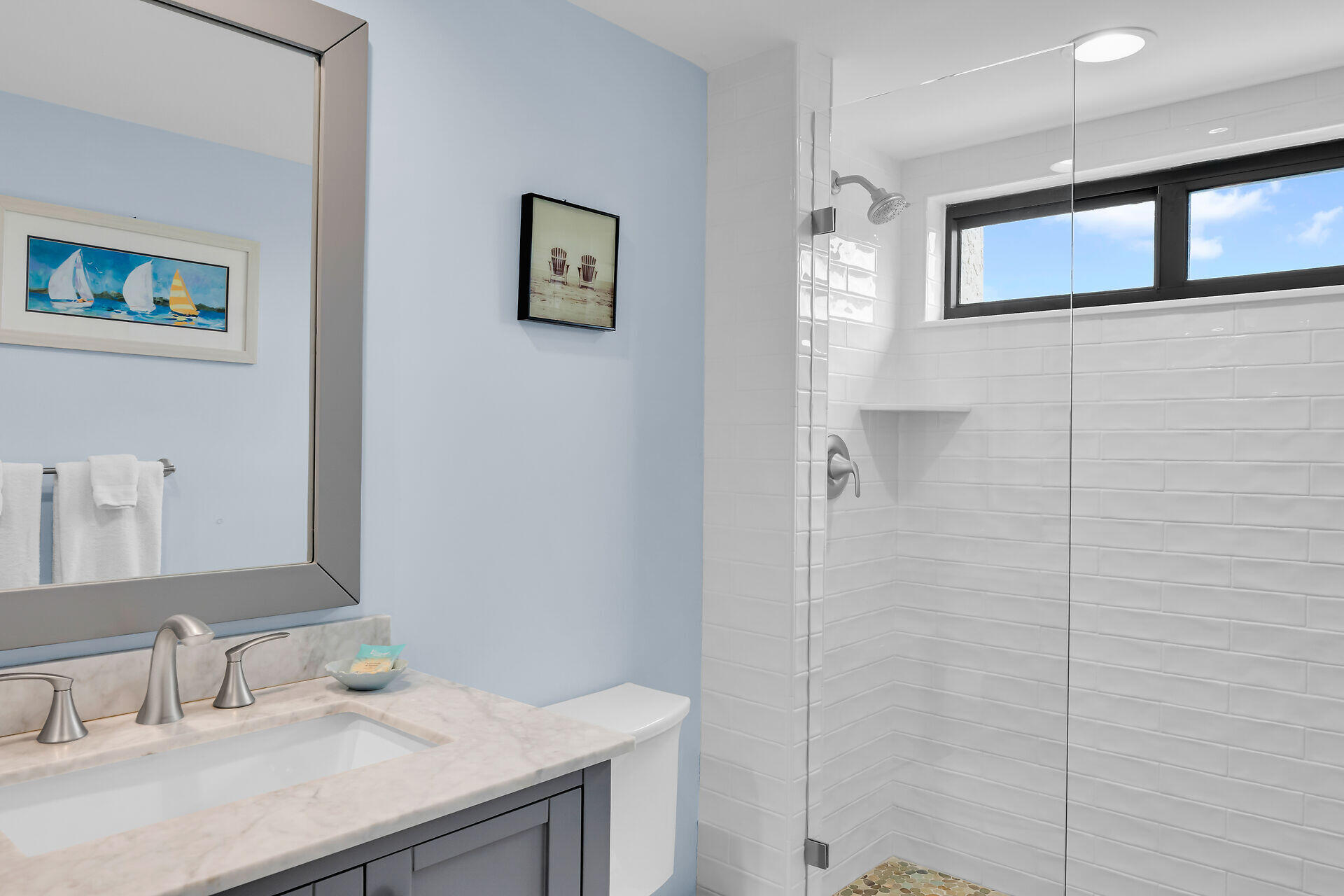 1133 West Ocean Drive, Unit 6 Key Colony Beach, FL 33051 - Photo 58 of 73 a bathroom with a sink and a mirror