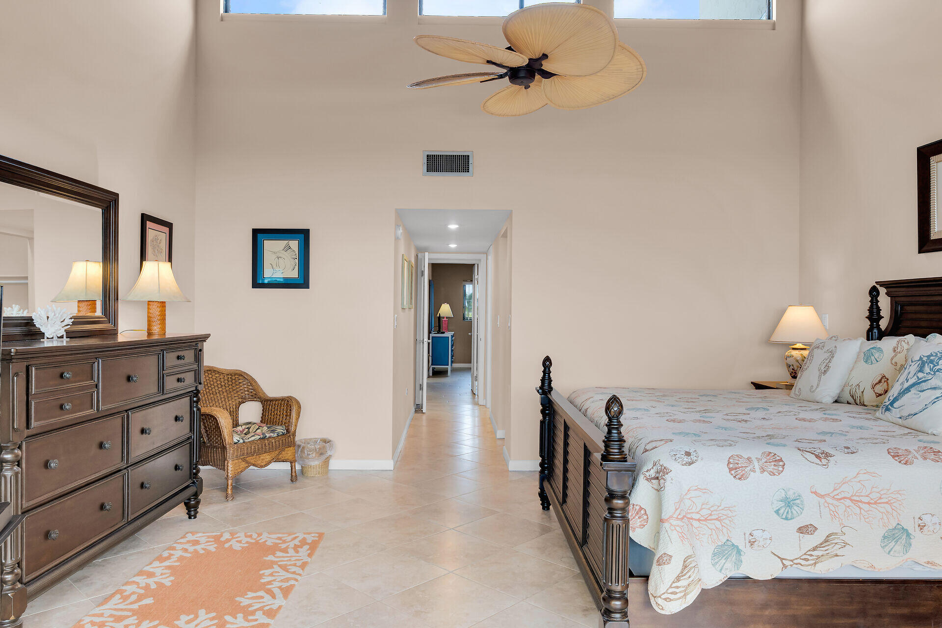 1133 West Ocean Drive, Unit 6 Key Colony Beach, FL 33051 - Photo 8 of 73 a bedroom with a bed and a dresser in it