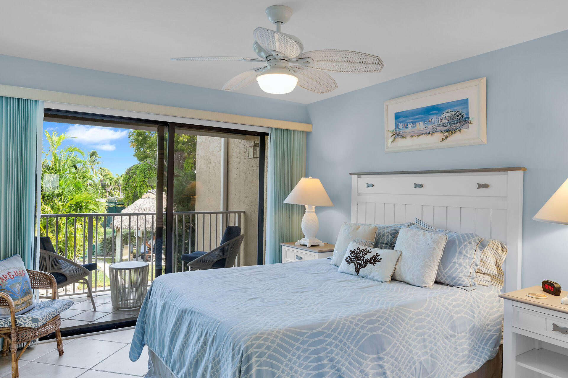 1133 West Ocean Drive, Unit 6 Key Colony Beach, FL 33051 - Photo 9 of 73 a bed room with a bed and a large window