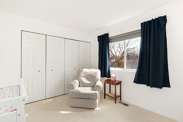 5226 South Berkeley Avenue Chicago, IL 60615 - Photo 14 of 28 a living room with furniture and a large window