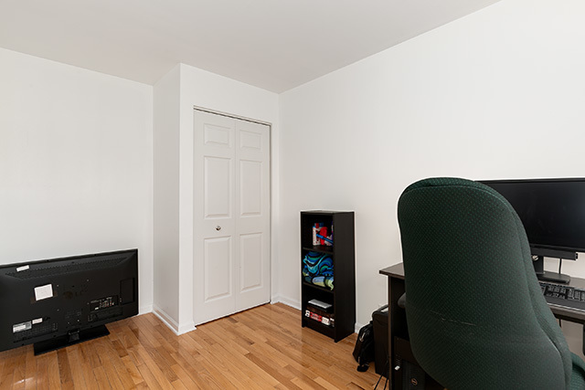 5226 South Berkeley Avenue Chicago, IL 60615 - Photo 22 of 28 wooden floor in a bedroom