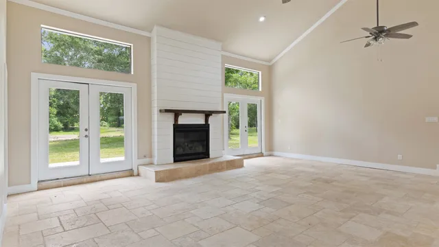 a view of a kitchen with a sink and cabinets