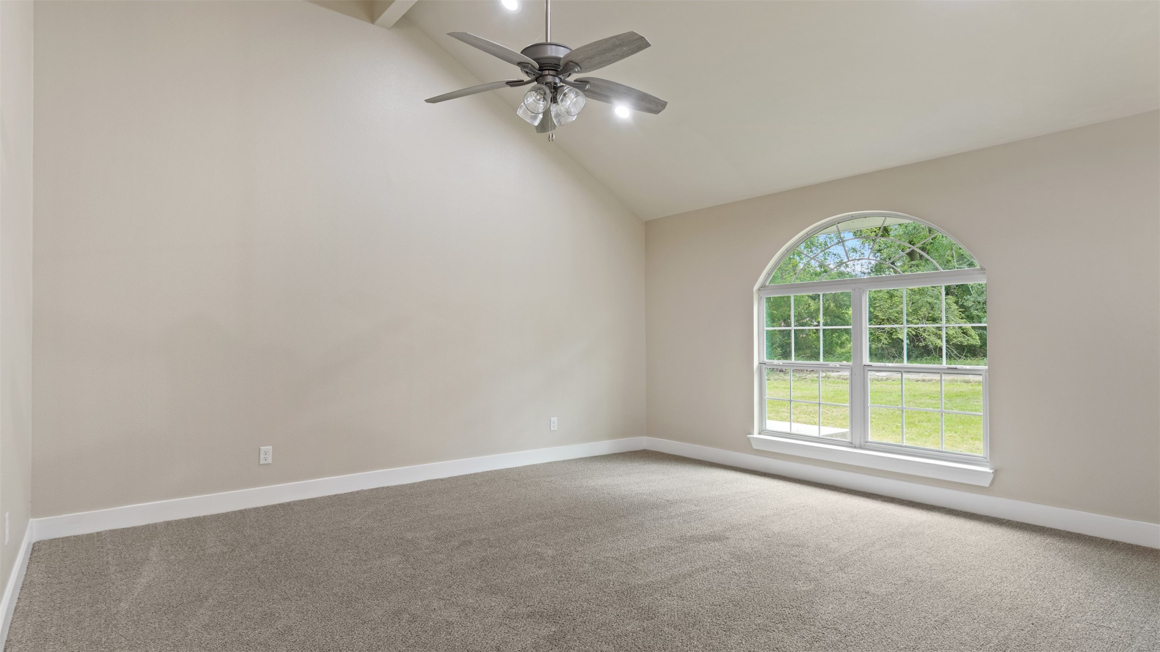 10308 Ehlers Road Conroe, TX 77302 - Photo 19 of 33 an empty room with a window and a fan