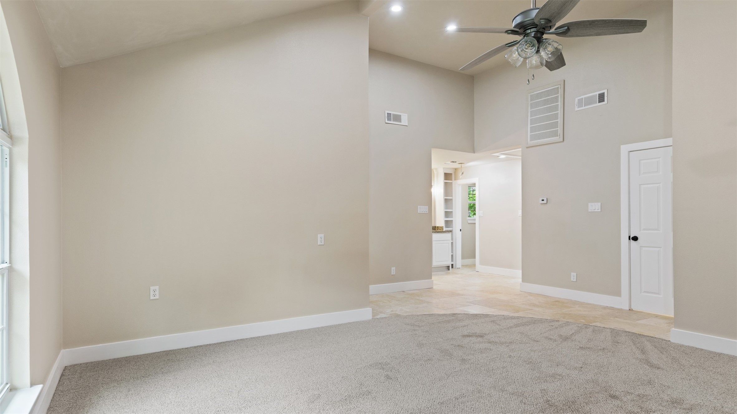 10308 Ehlers Road Conroe, TX 77302 - Photo 24 of 33 an empty room with fan and entrance