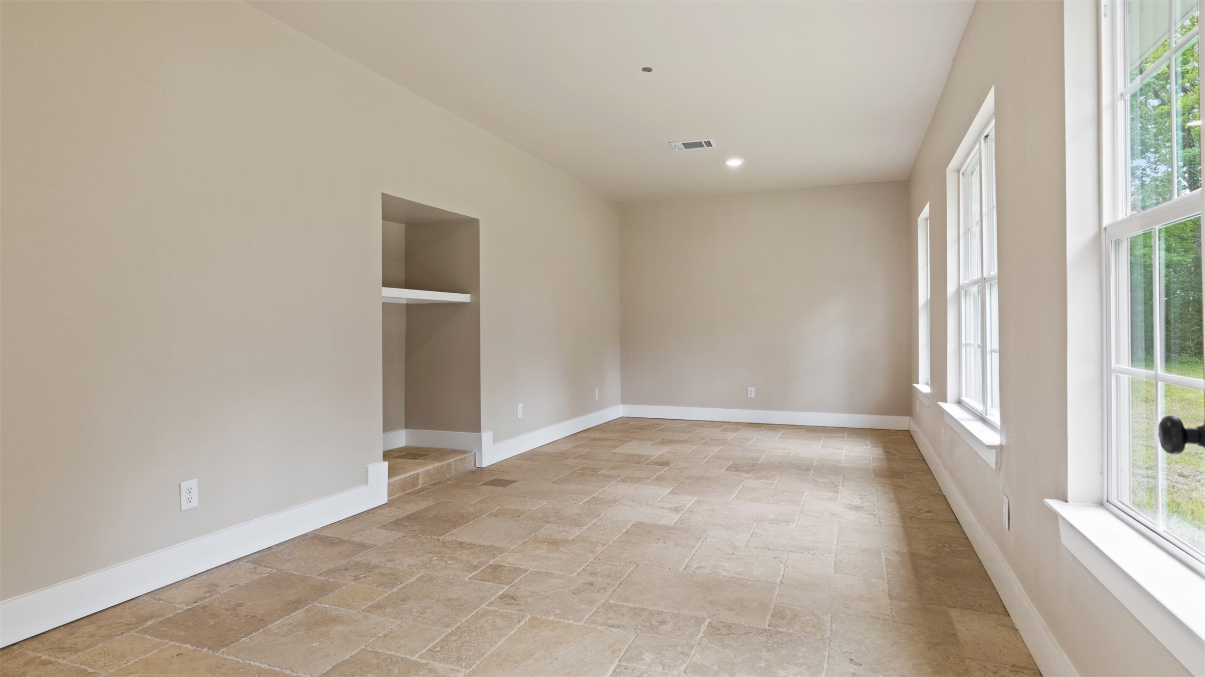 10308 Ehlers Road Conroe, TX 77302 - Photo 27 of 33 an empty room with windows