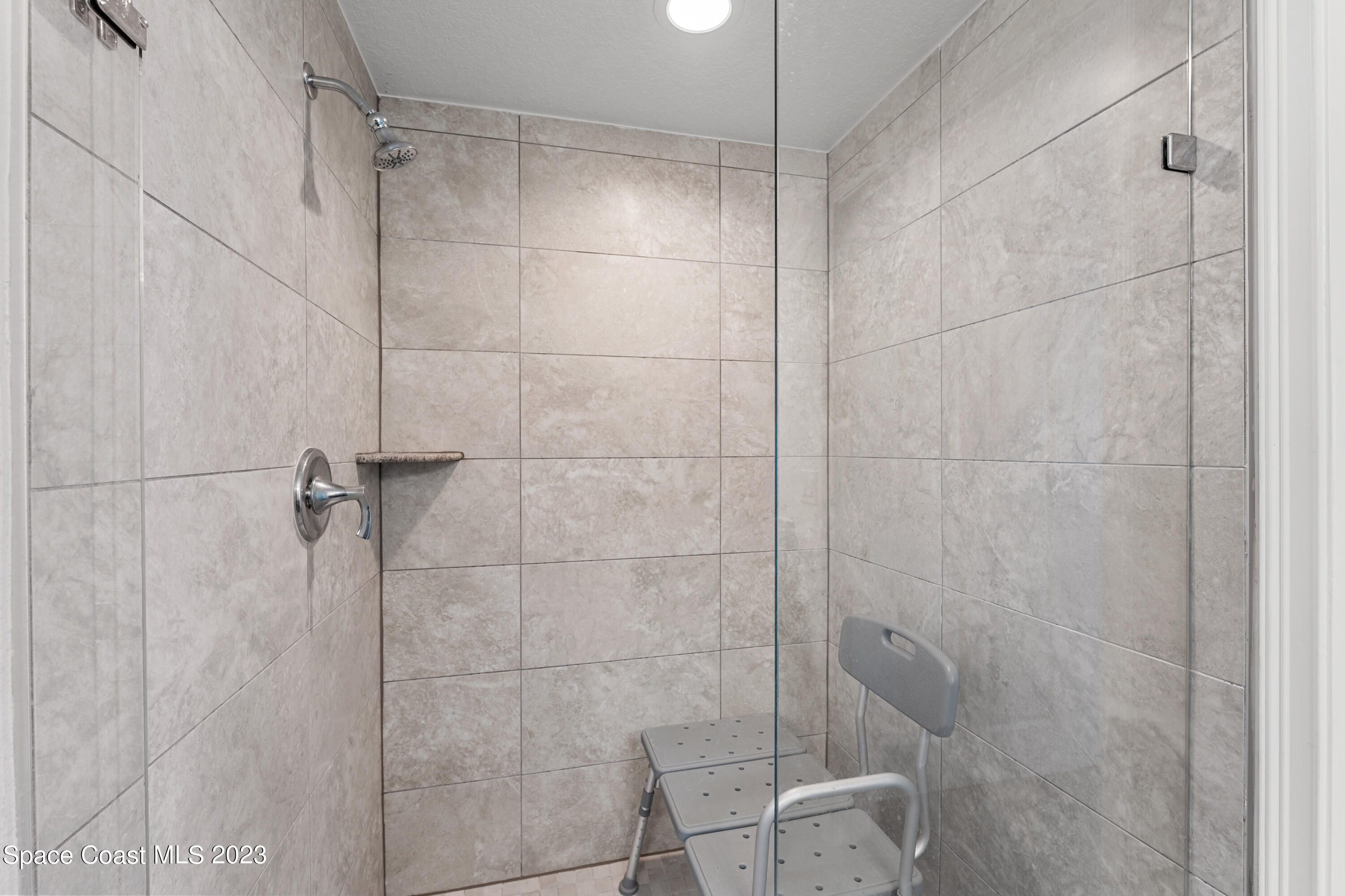 1825 Riverside Drive, Unit 305S Titusville, FL 32780 - Photo 26 of 34 Primary Shower