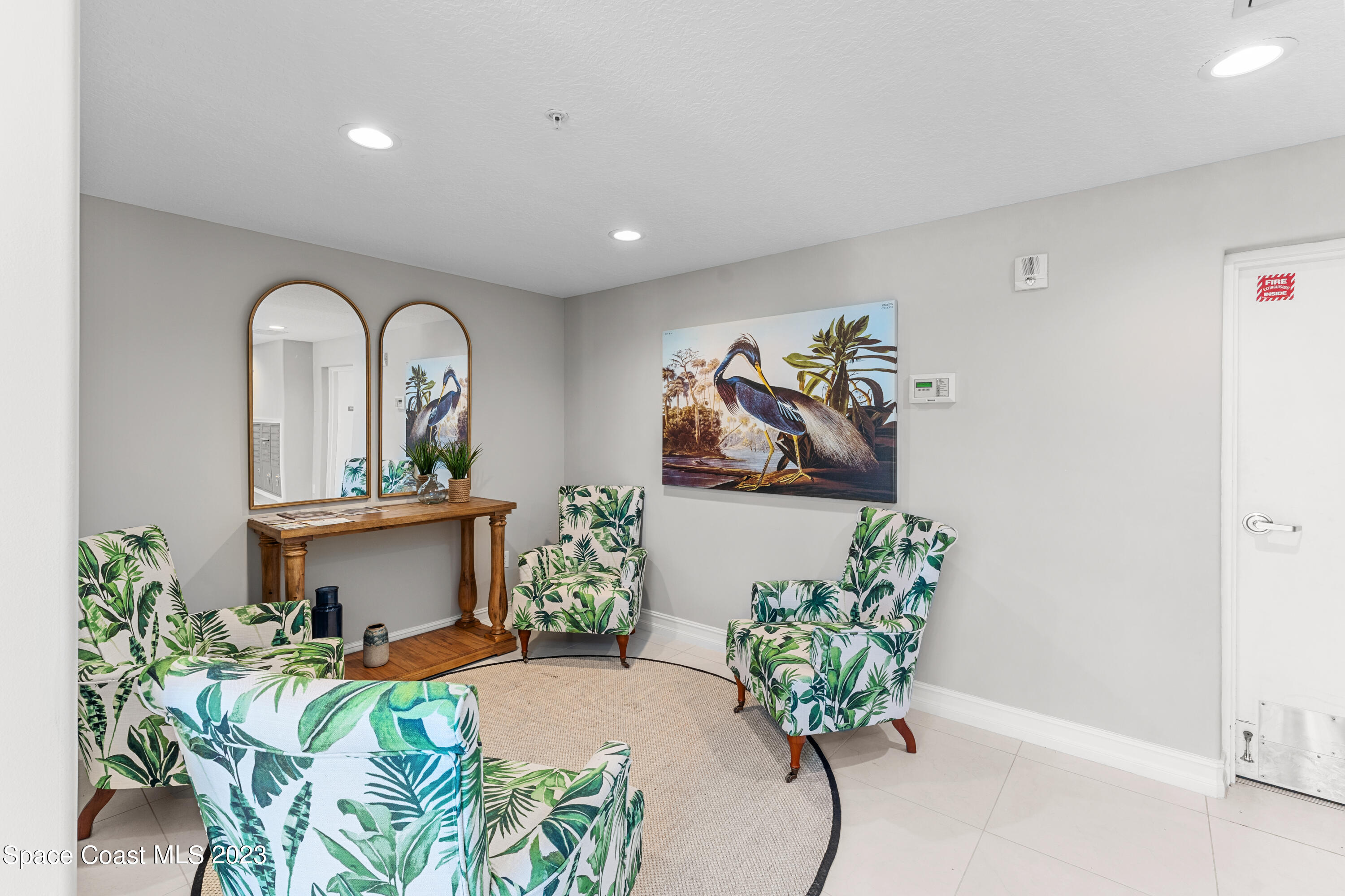 1825 Riverside Drive, Unit 305S Titusville, FL 32780 - Photo 28 of 34 a view of living room with furniture and a potted plant