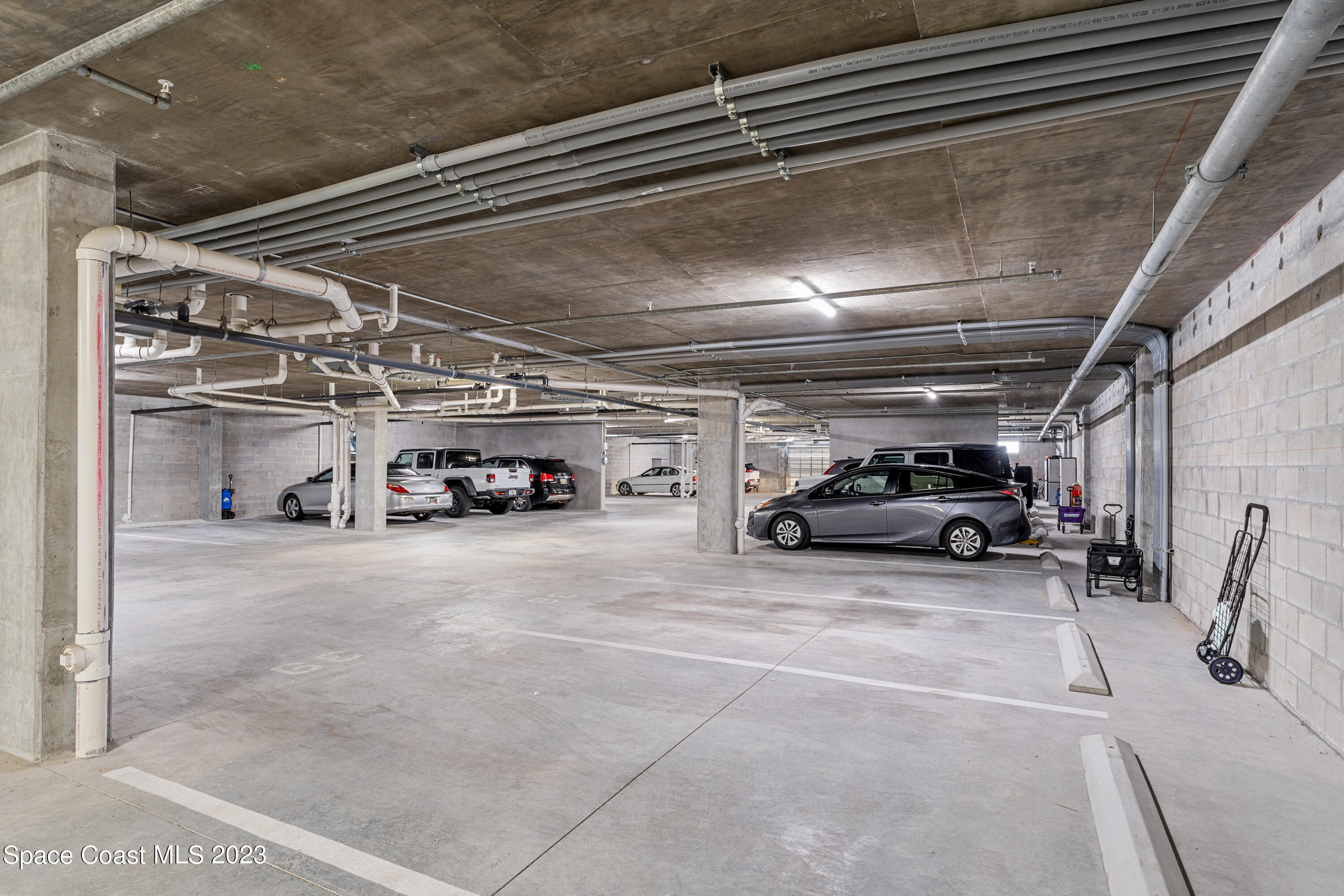 1825 Riverside Drive, Unit 305S Titusville, FL 32780 - Photo 29 of 34 a car parked in garage