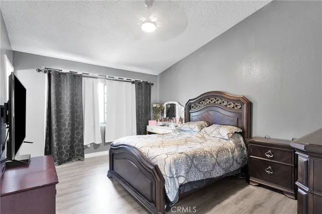 a bathroom with a double vanity sink toilet and shower