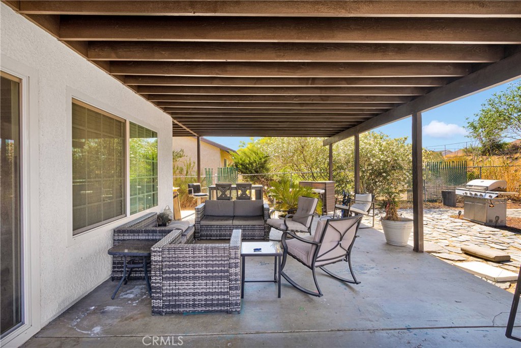 14111 Liberty Way Victorville, CA 92392 - Photo 29 of 39 a outdoor space with patio lots of furniture