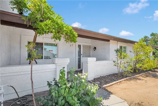 a house view with a outdoor space