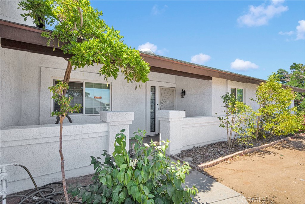 14111 Liberty Way Victorville, CA 92392 - Photo 3 of 39 a house view with a outdoor space