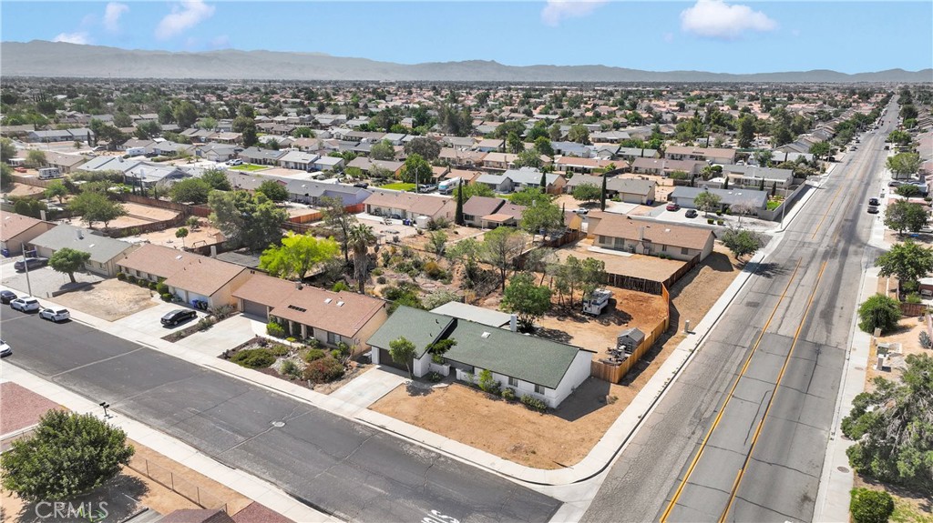 14111 Liberty Way Victorville, CA 92392 - Photo 35 of 39 an aerial view of residential houses with outdoor space