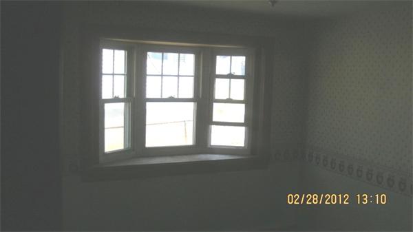 16 Plant Road Waltham, MA 02451 - Photo 15 of 18 an empty room with a window