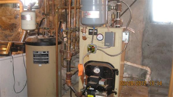 16 Plant Road Waltham, MA 02451 - Photo 17 of 18 a utility room with dryer and washer