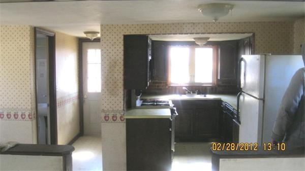 16 Plant Road Waltham, MA 02451 - Photo 5 of 18 a kitchen with refrigerator and window